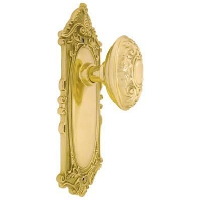 Victorian Polished Brass Egg Knob with Escutcheon Passage by Westmore