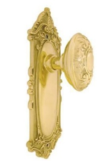 Victorian Polished Brass Egg Knob with Escutcheon Privacy by Westmore